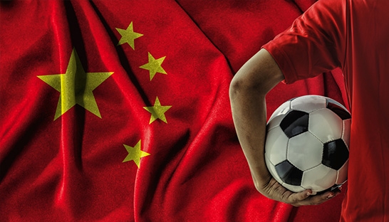 Debt-ridden Chinese football plays a risky game